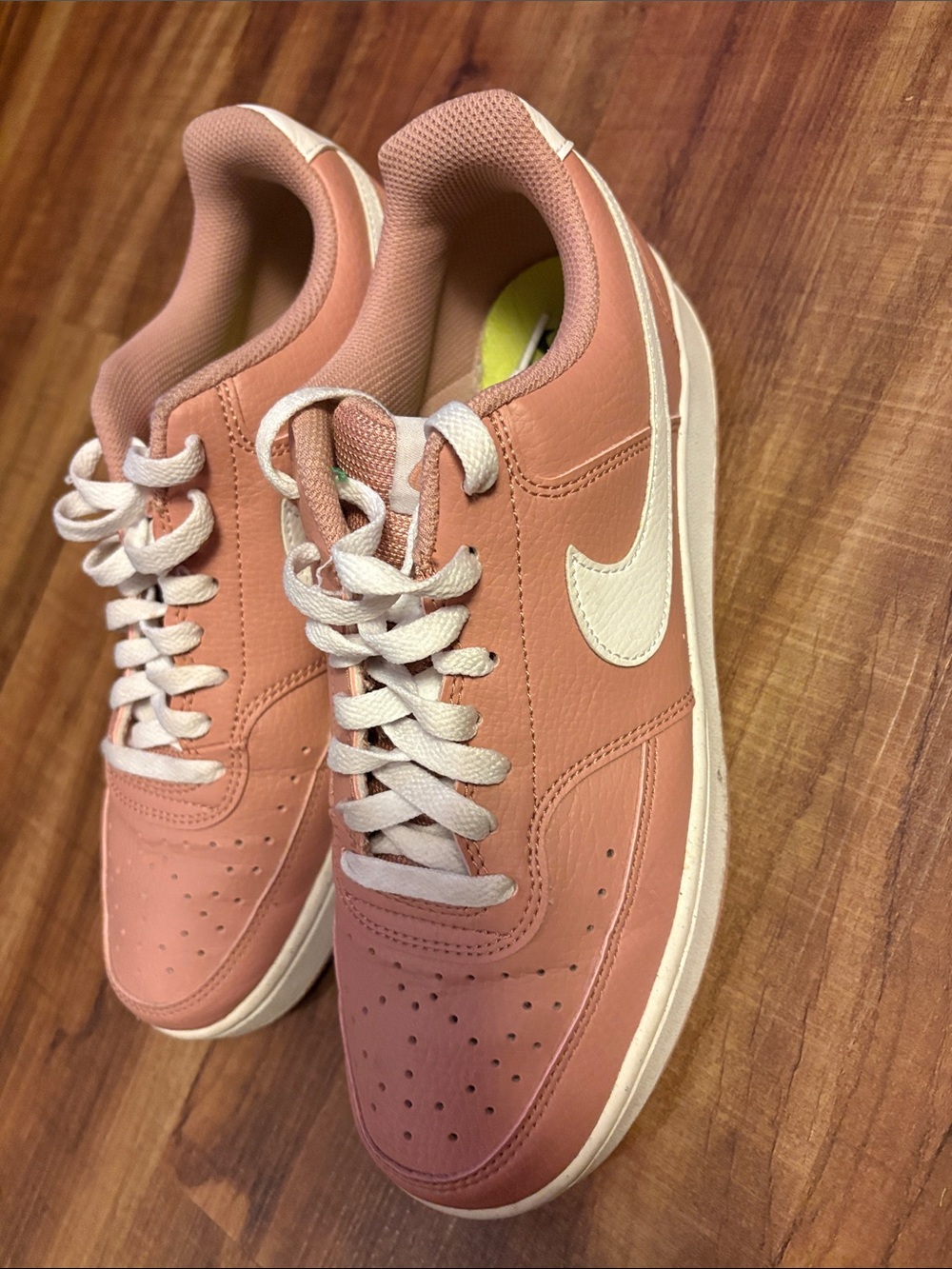 Nike Women's Rose Pink Leather Sneakers with White Swoosh